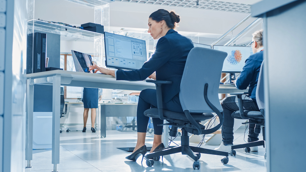 Executive woman leader at desk